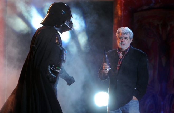 UNIVERSAL CITY, CA - OCTOBER 15: Darth Vader accepts the Ultimate Villain award from George Lucas onstage during Spike TV's "SCREAM 2011" awards held at Universal Studios on October 15, 2011 in Universal City, California. (Photo by Kevin Winter/Getty Images)