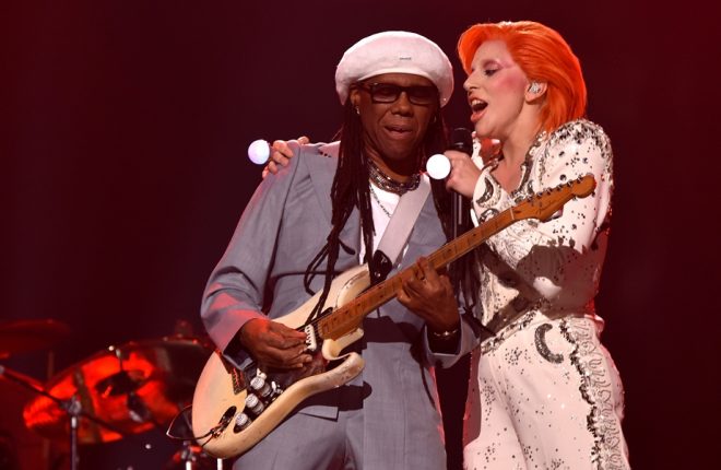 LOS ANGELES, CA - FEBRUARY 15: Musician/producer Nile Rodgers (L) and singer Lady Gaga perform a tribute to the late David Bowie onstage during The 58th GRAMMY Awards at Staples Center on February 15, 2016 in Los Angeles, California. (Photo by Larry Busacca/Getty Images for NARAS)
